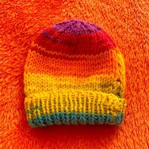 Handmade knitted colourful baby’s winter hat